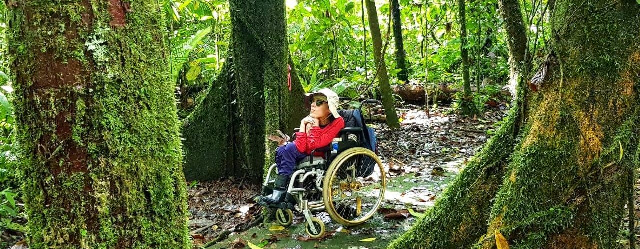 Lady in wheelchair in the forest