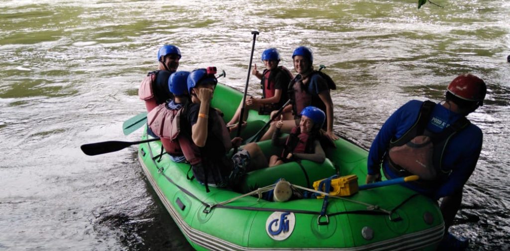 Family on river raft