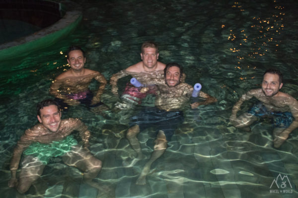 Group of people inside hot spring pool
